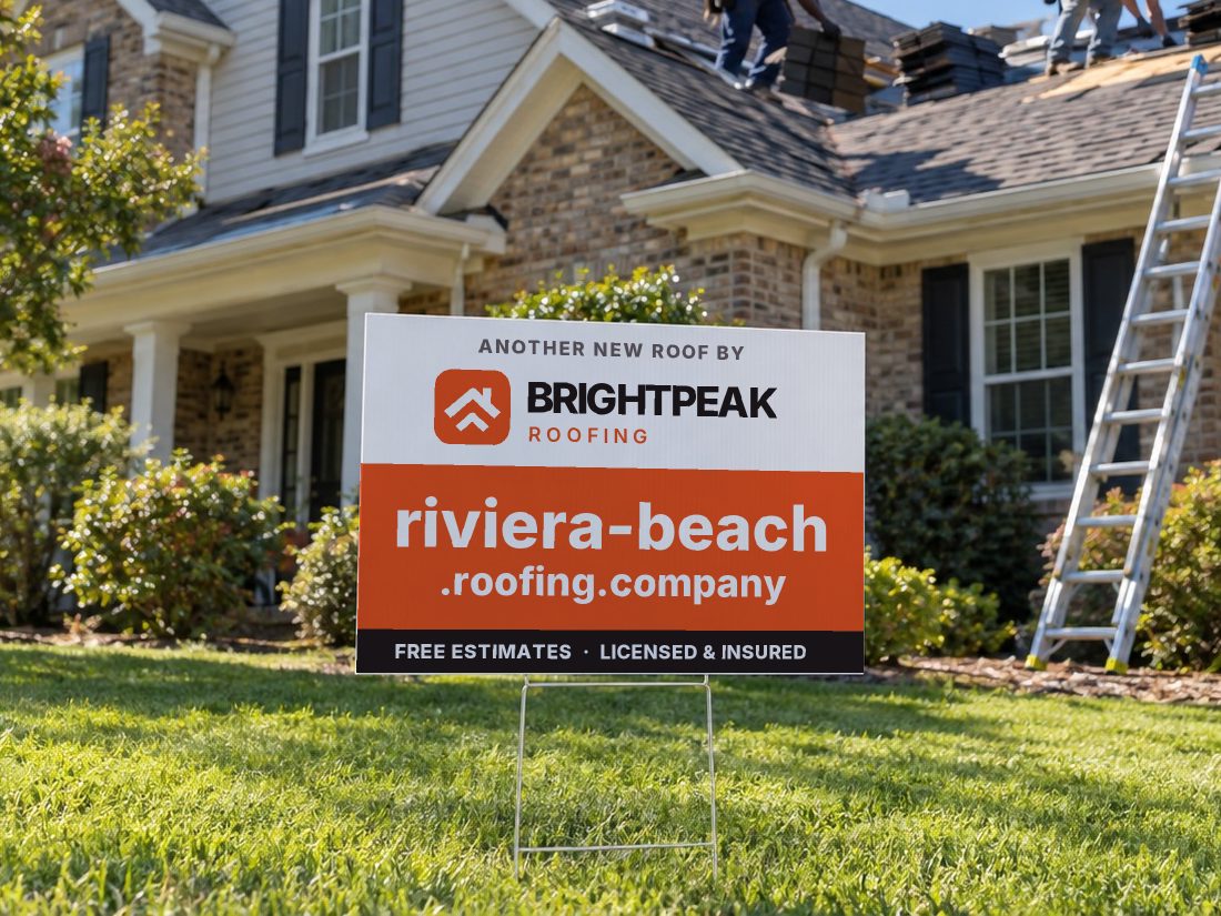 riviera-beach.roofing.company on a yard sign in front of a house getting a new roof